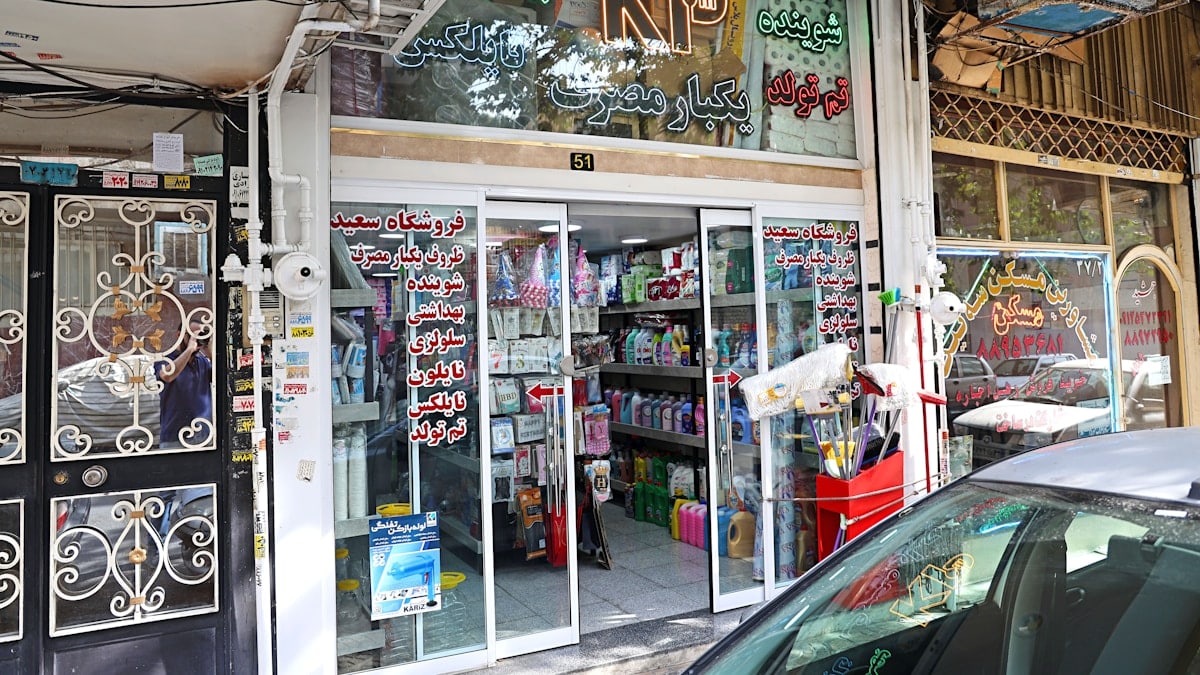 The interior space, equipment, and products of a detergent and hygiene supplies store in Tehran.